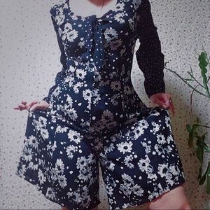 It’s a PANTSUIT!! Black and white floral romper!